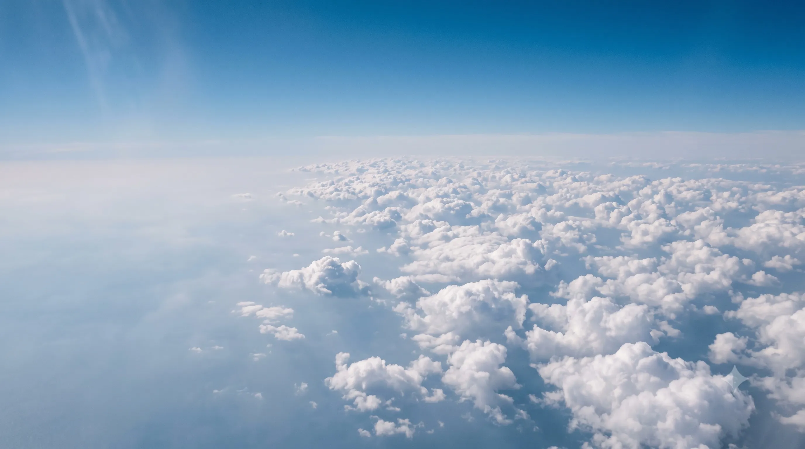 Calm blue sky with white clouds